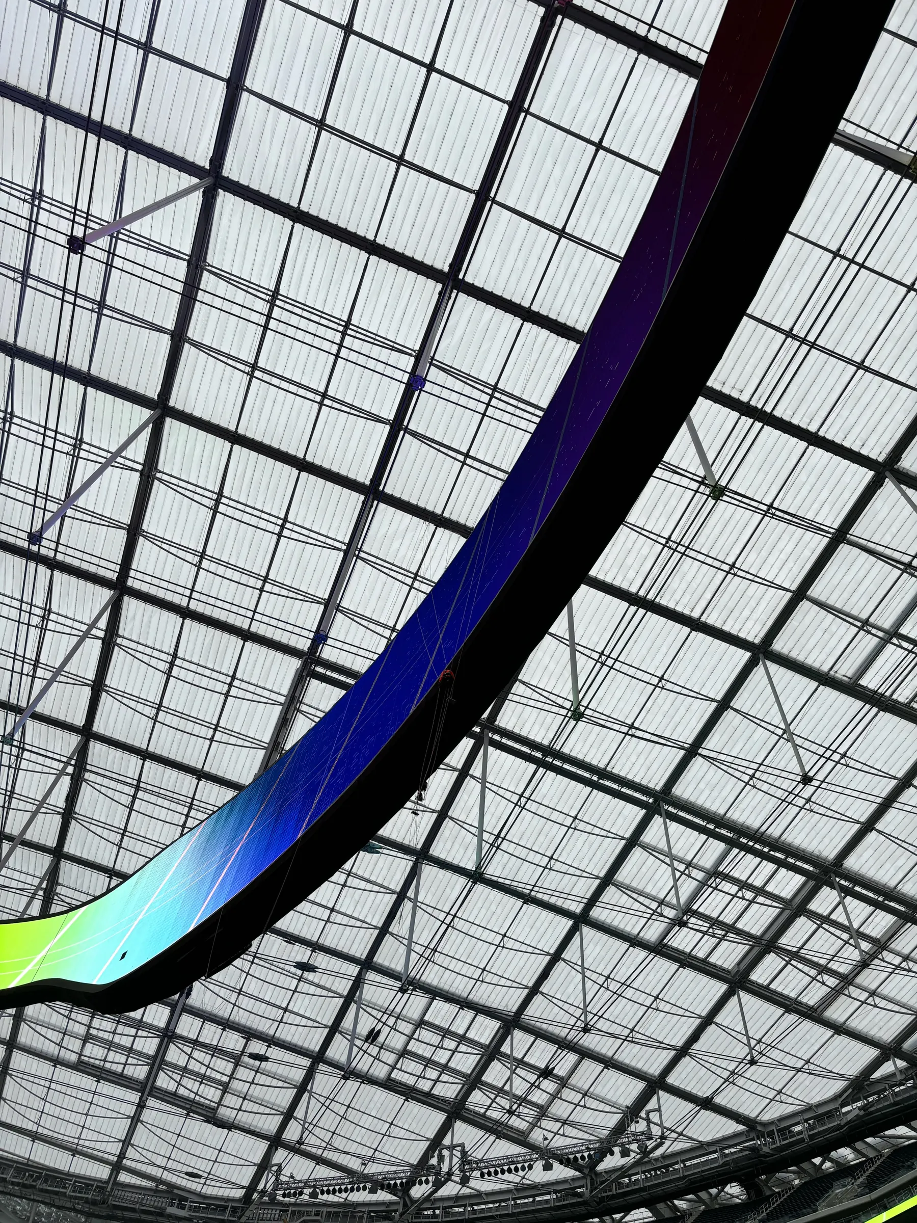 Close view of a stadium video screen and the steel structure behind it during cleaning
